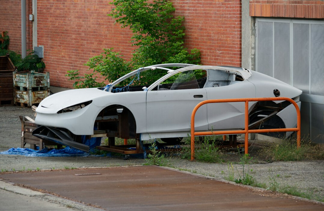Car body being prepared for rust spot removal